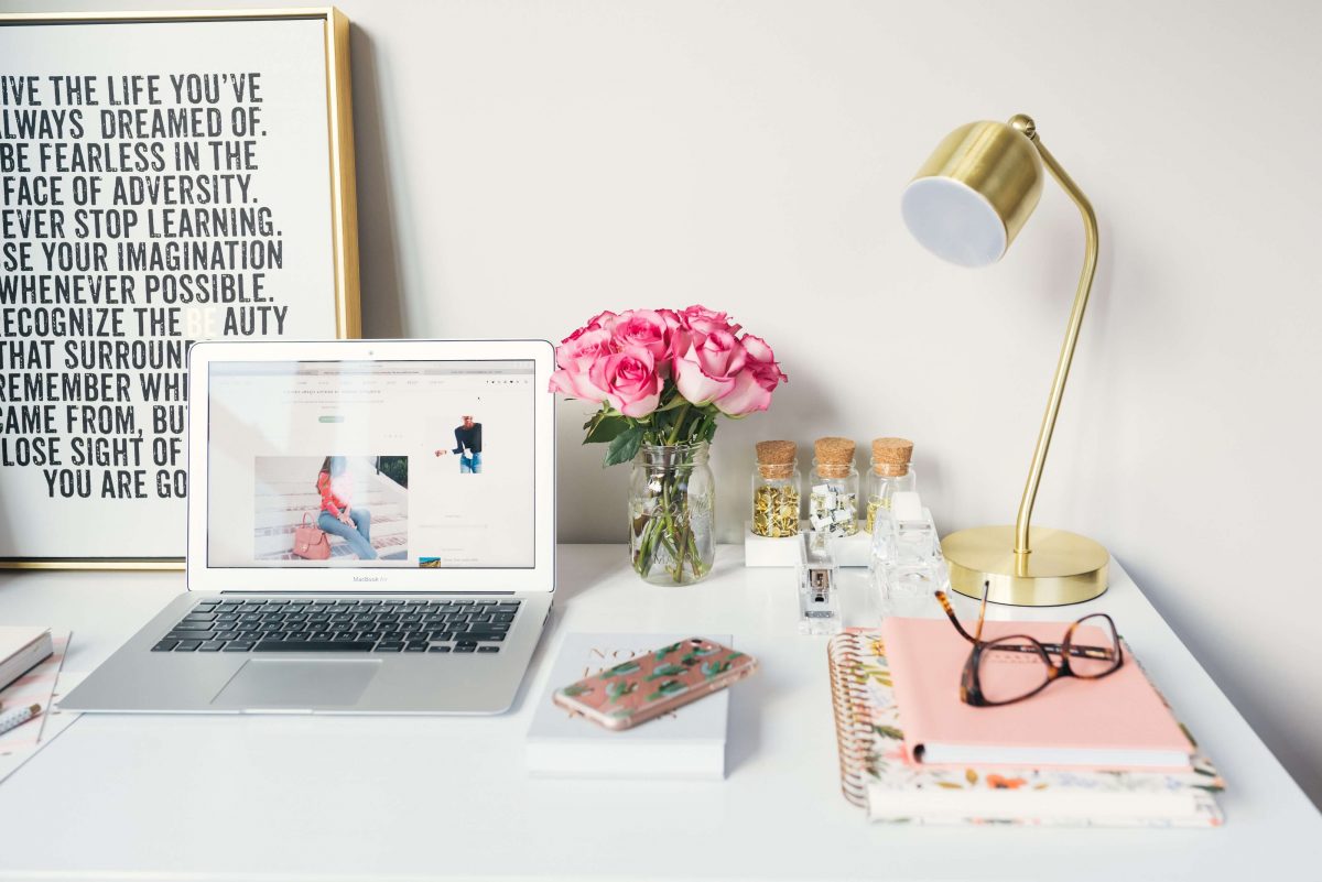 desk with laptop for blogging