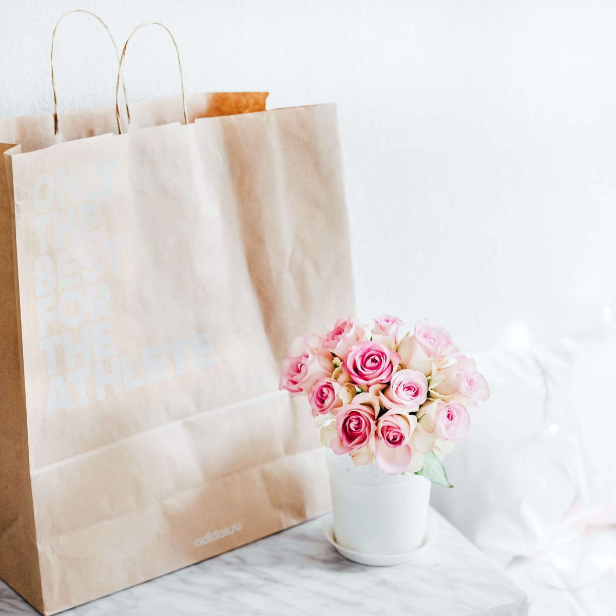 Shopping bag and pink flowers Content Savvy