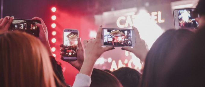 concert goers creating user generated content